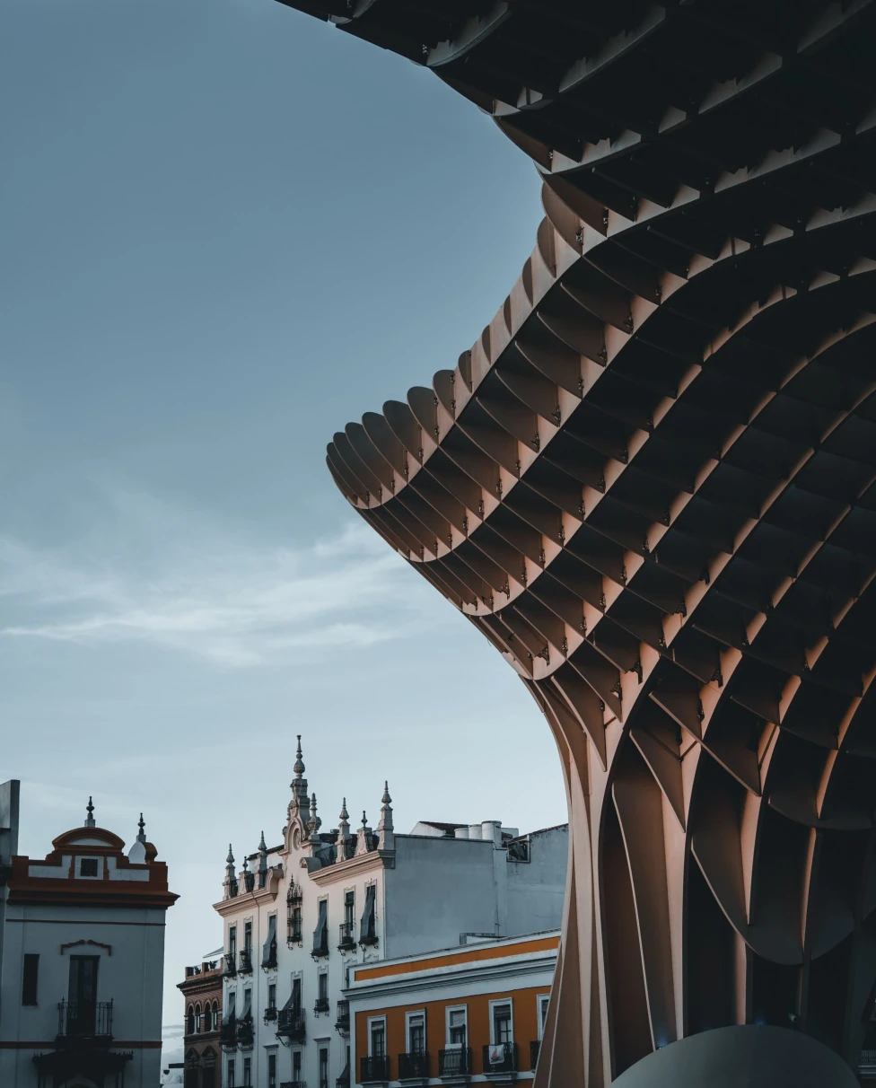 view of old city through contemporary wall