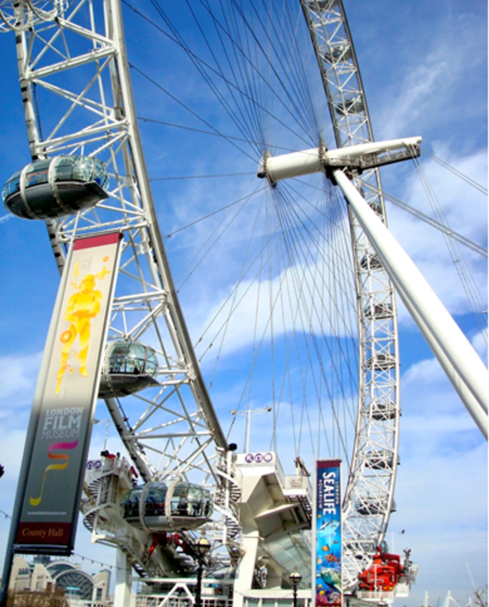 A low-angled Ferris wheel at daytime.