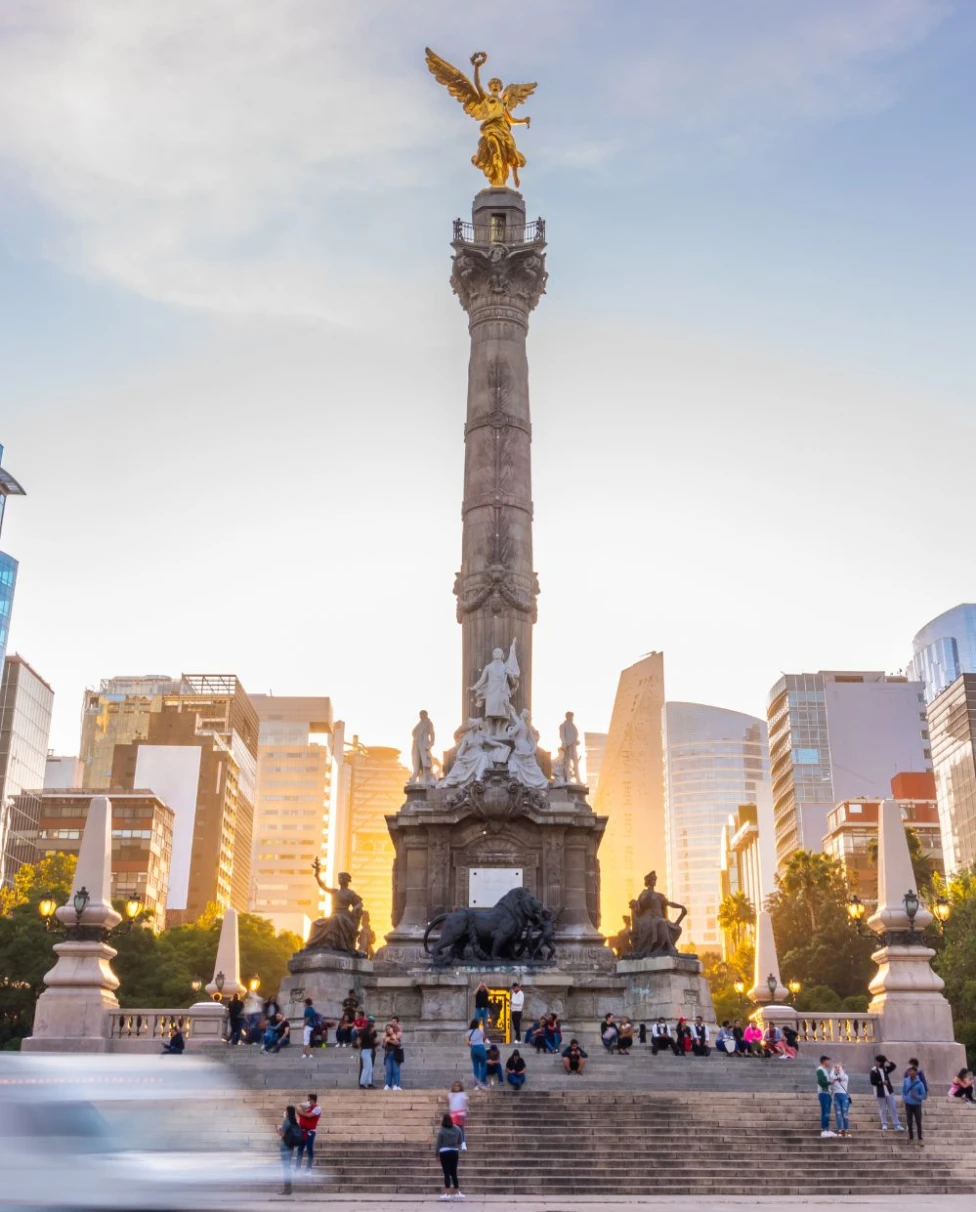 Statue with a beautiful gold angel at the top.