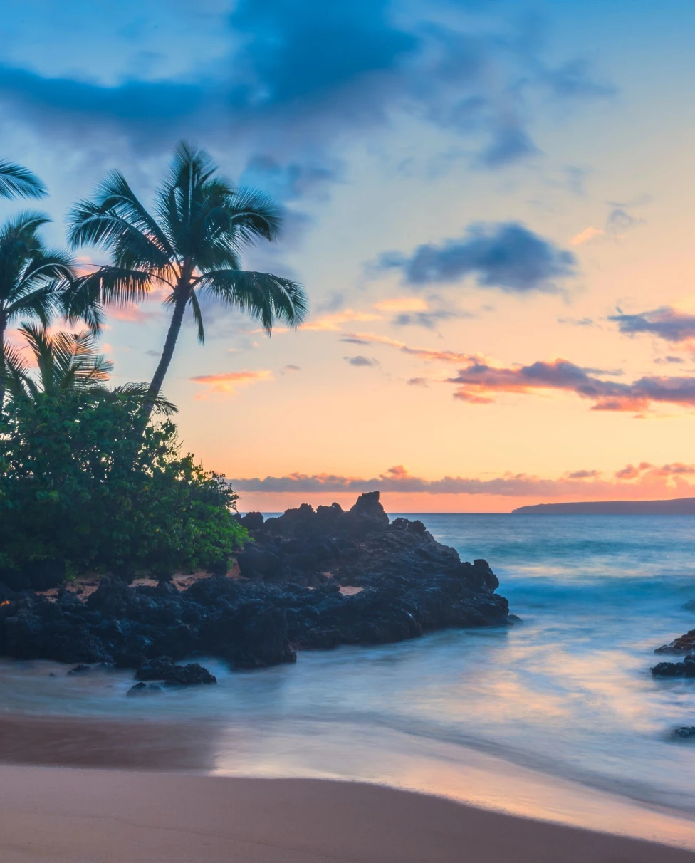 Beach view with blue colored water and skies.