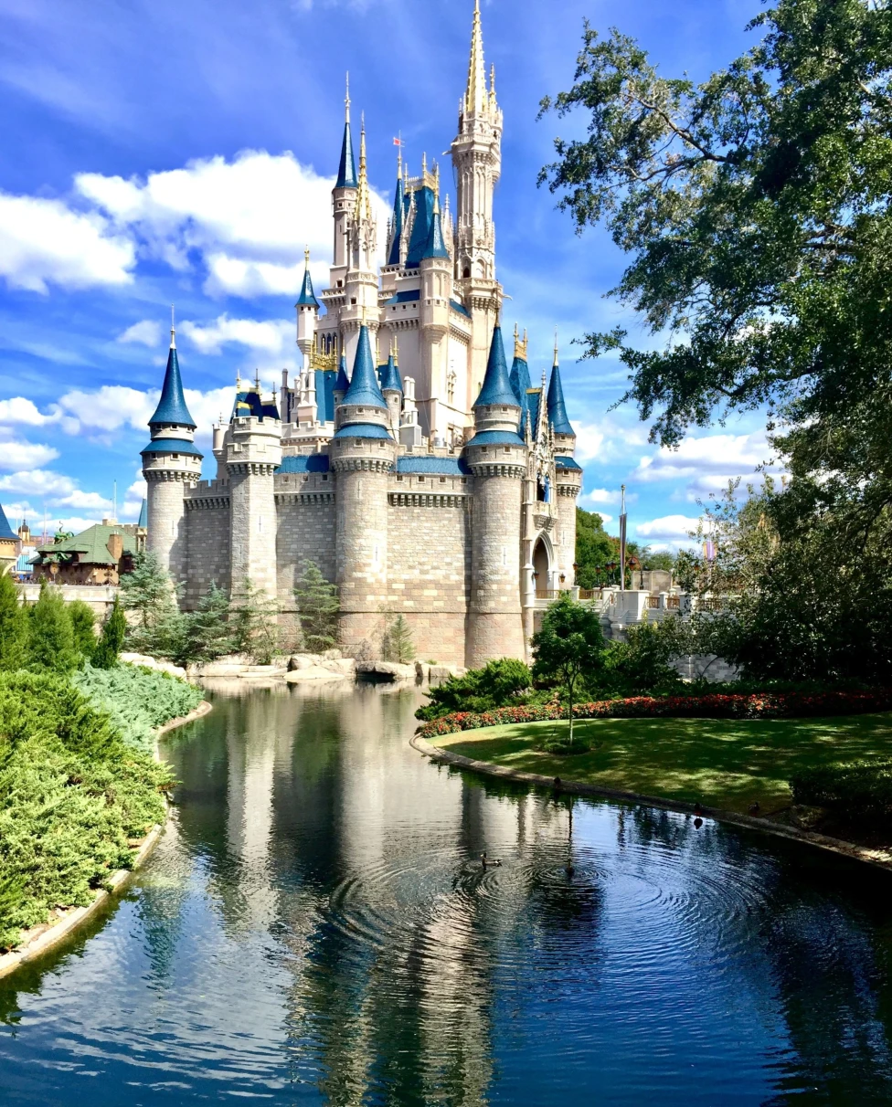 A disney castle picture in daytime.