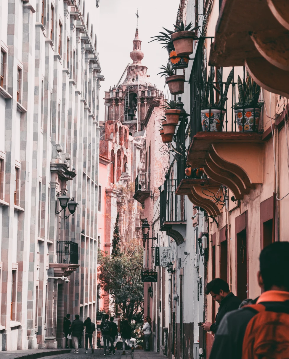 pink building between two other buildings