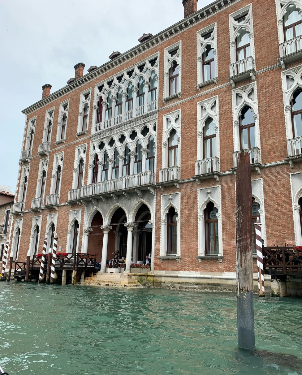 City canal in front of a building.