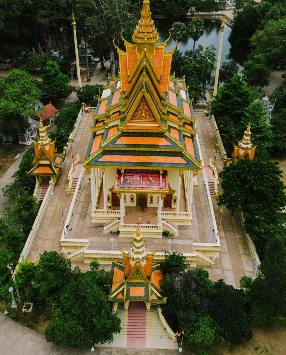 An overhead view of a large palace during the daytime