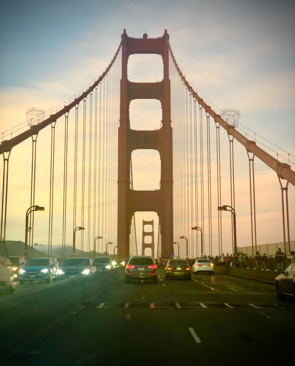 A picture of the Golden Gate Bridge at sunset.