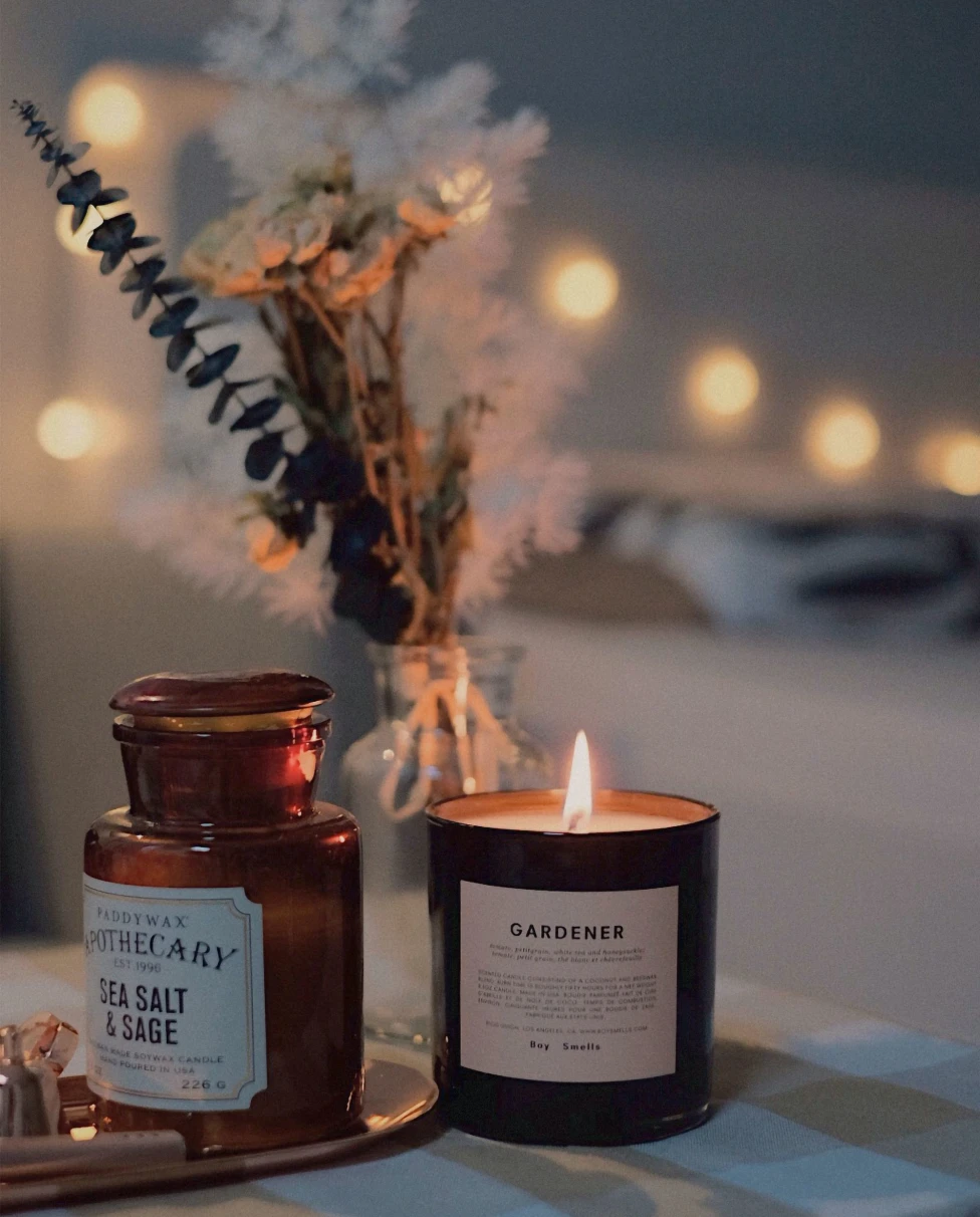 A picture of gardener votive candle on table