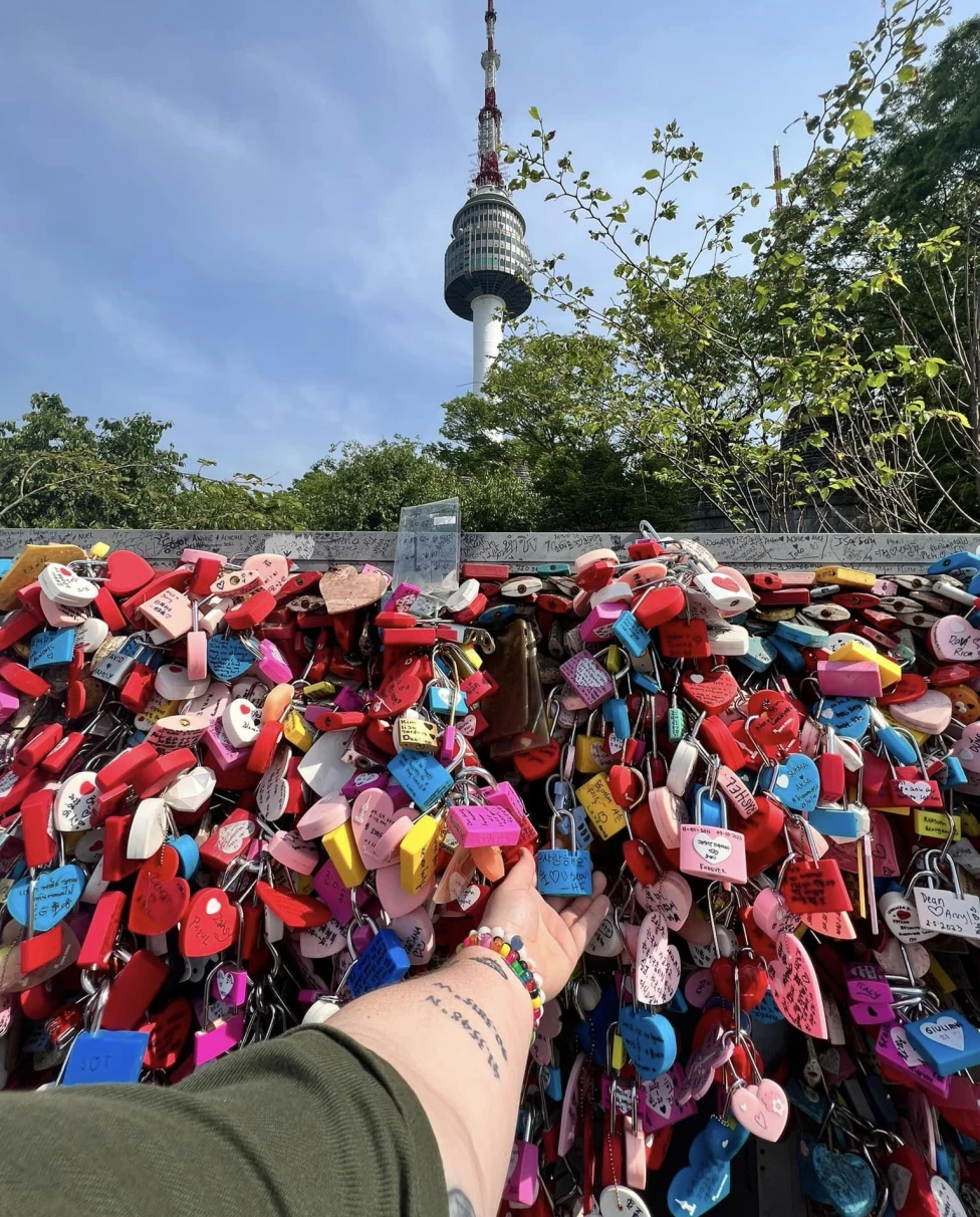 Love locks on a bridge in front of the Namsan Tower in Seoul, South Korea