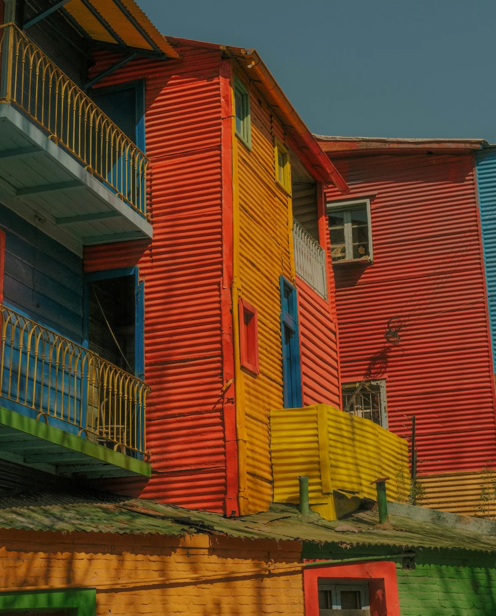A row of multicolored houses can be found in La Boca.