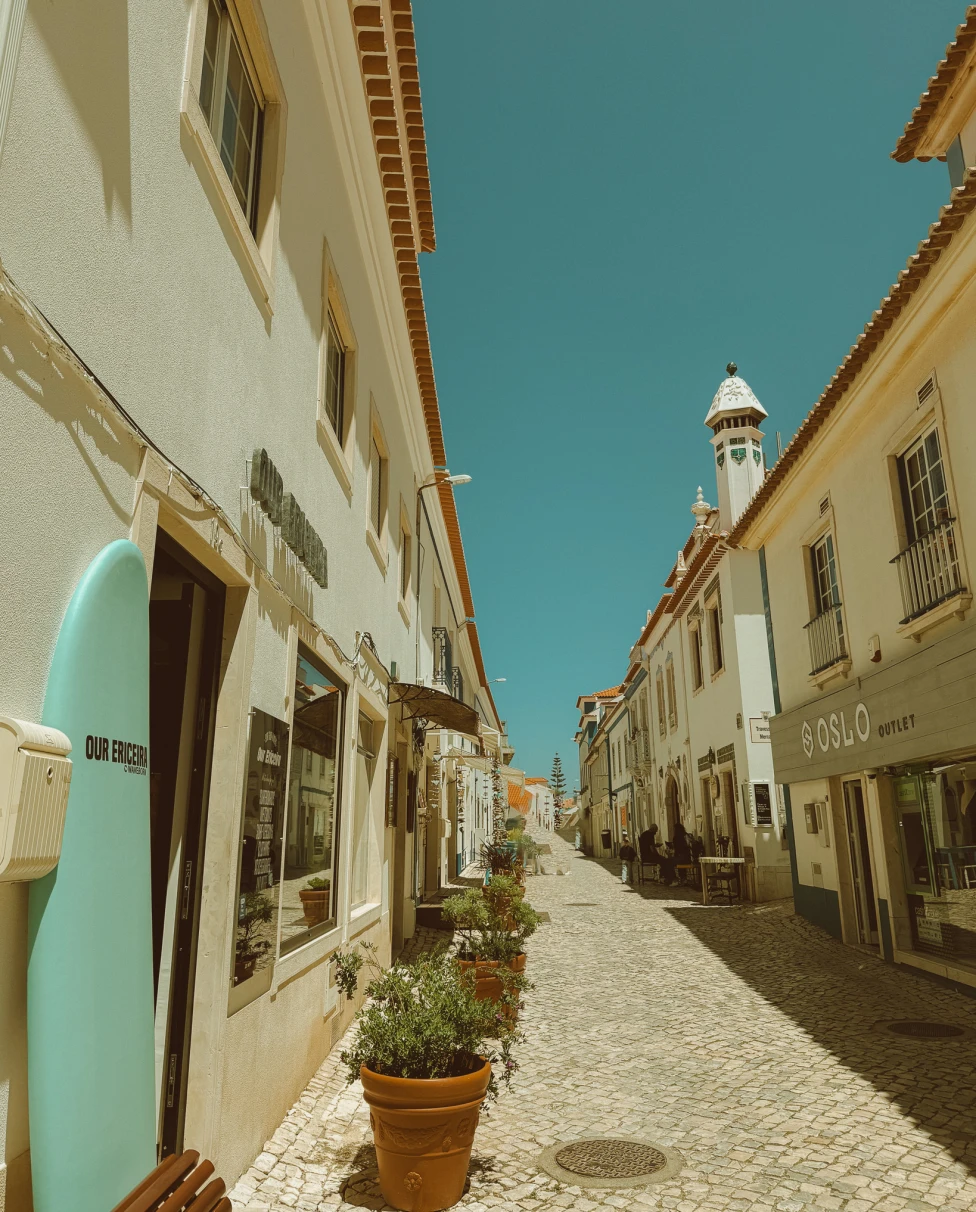 Narrow street in an old downtown during daytime.