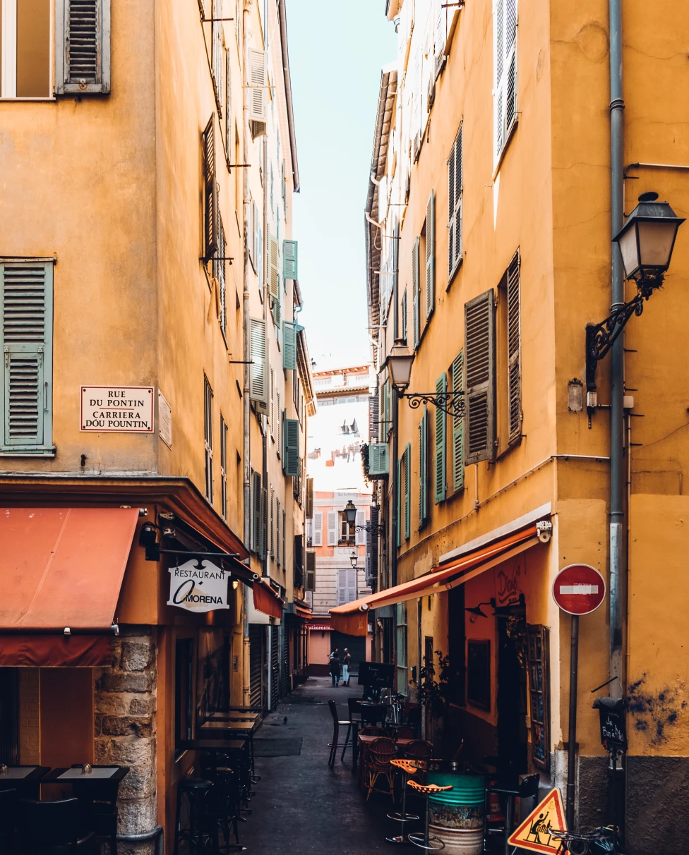 French riviera small streets and yellow buildings.