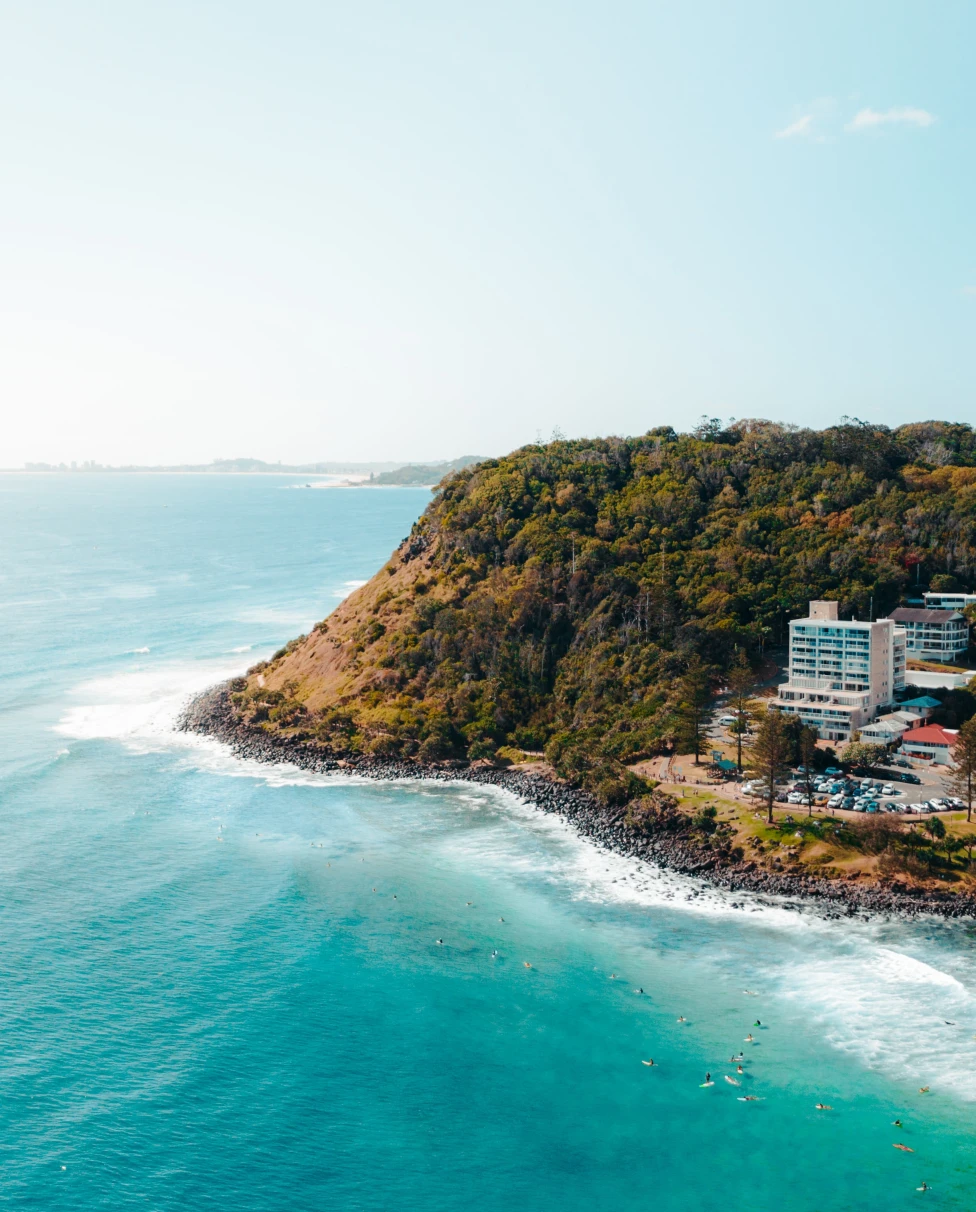aerial view of ocean and mountainside