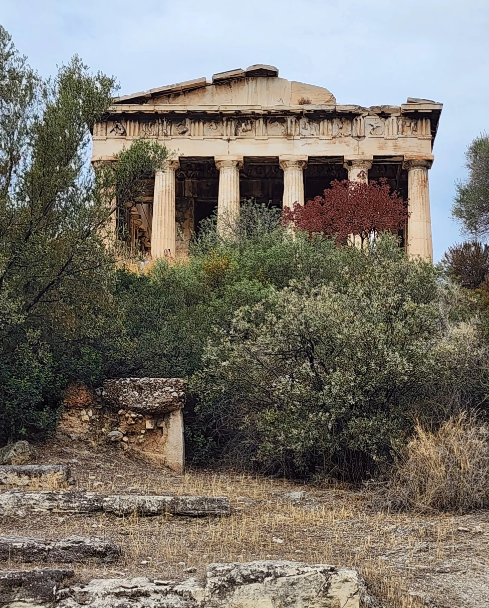 A picture of relics of an ancient building with pillars during daytime.