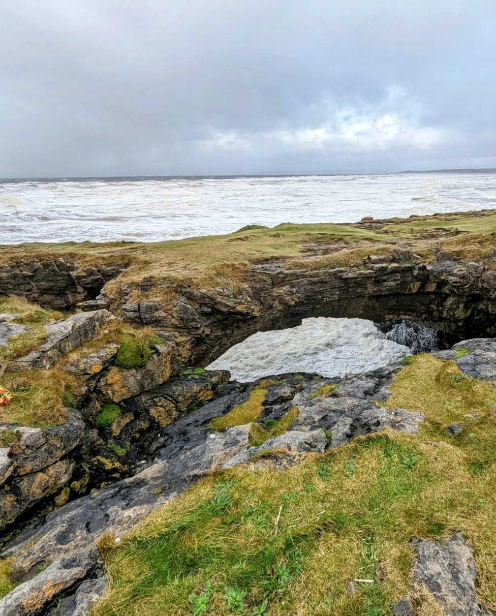 Rocky area with hole near the ocean on an Ireland 10 day itinerary.