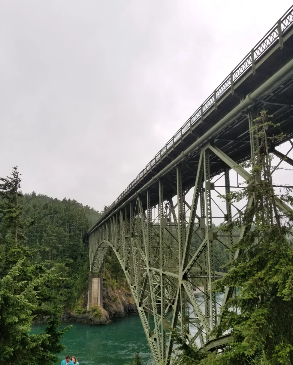 Deception Pass Bridge is an iconic steel marvel spanning the dramatic tidal strait of Deception Pass in Washington State, offering breathtaking views of the Pacific Northwest's rugged beauty.