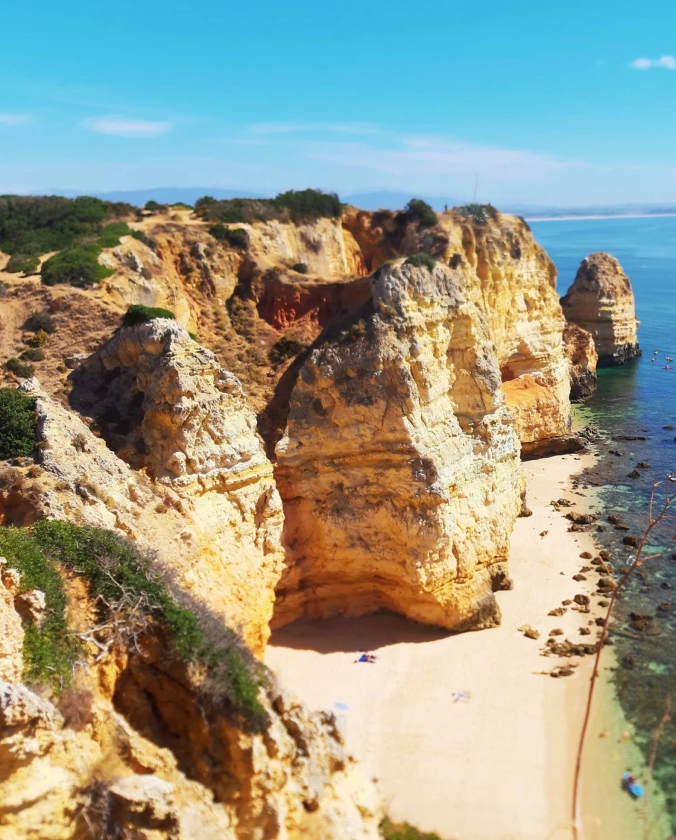 Rock formation near body of water.