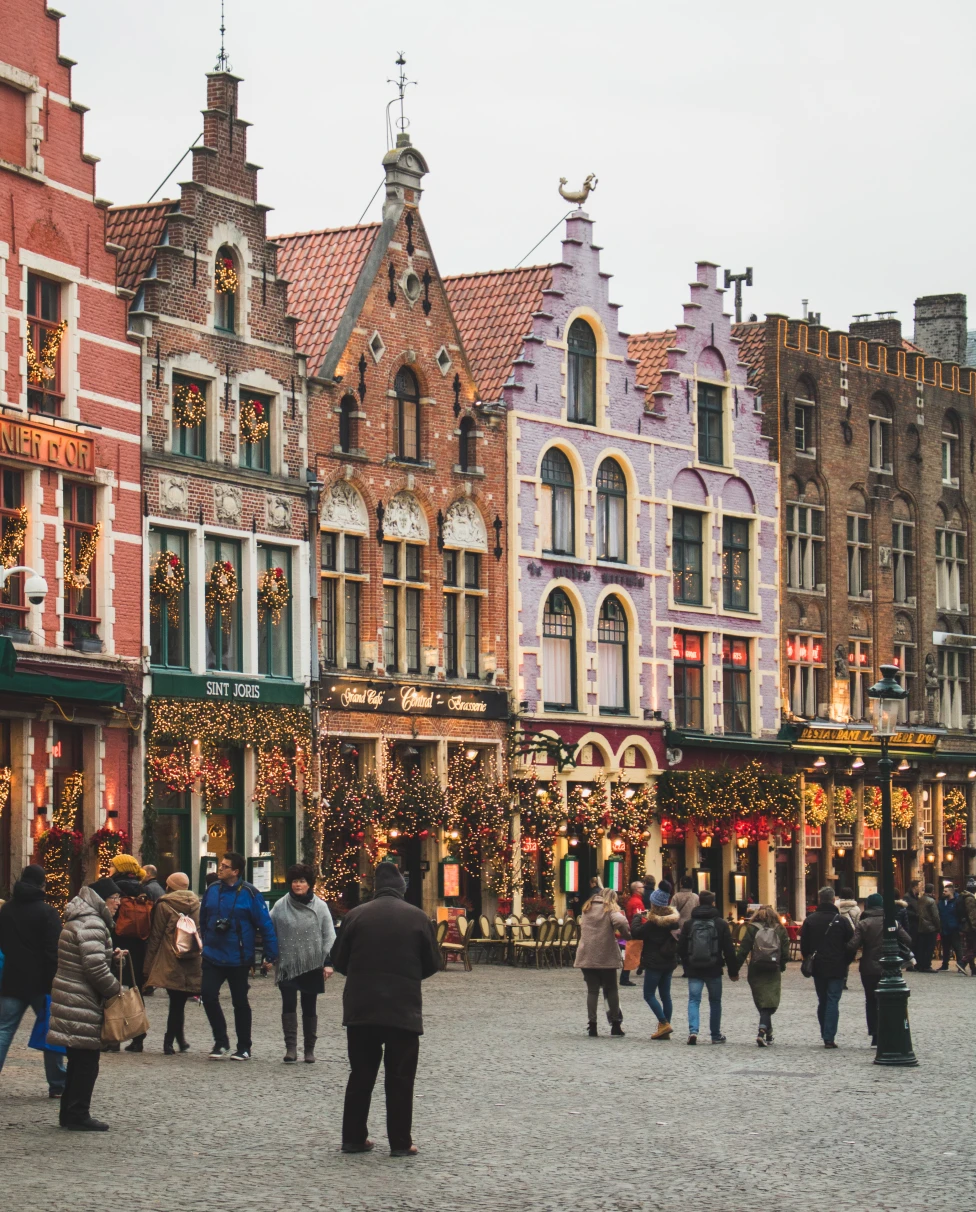 people standing in front of buildings during daytime
