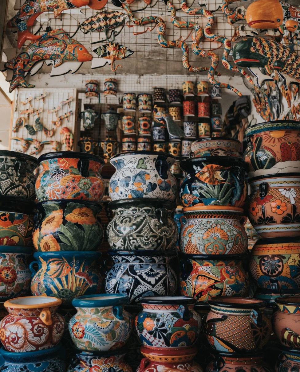 A picture of assorted-color clay pots.