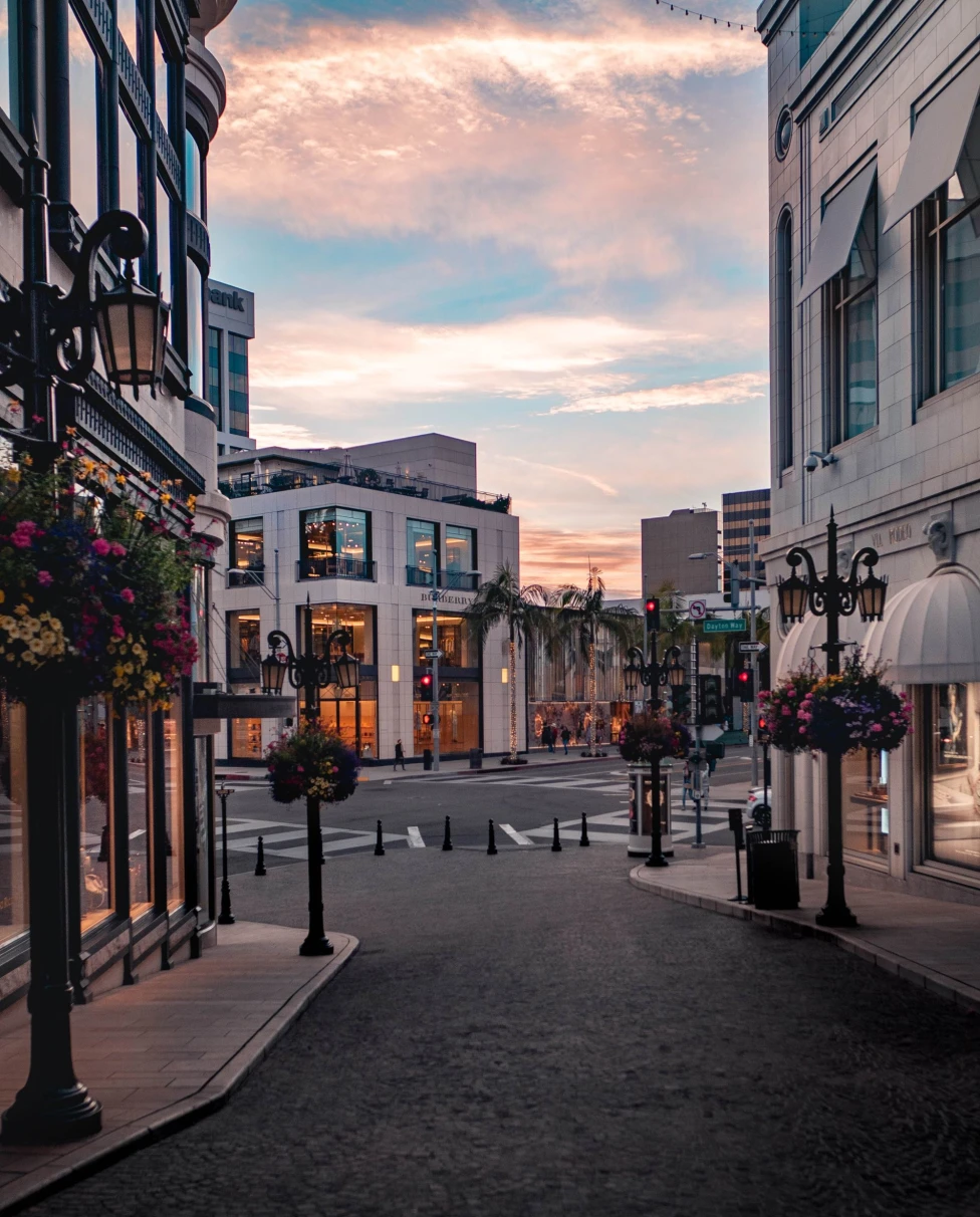 A street of Beverly Hills at sunset.