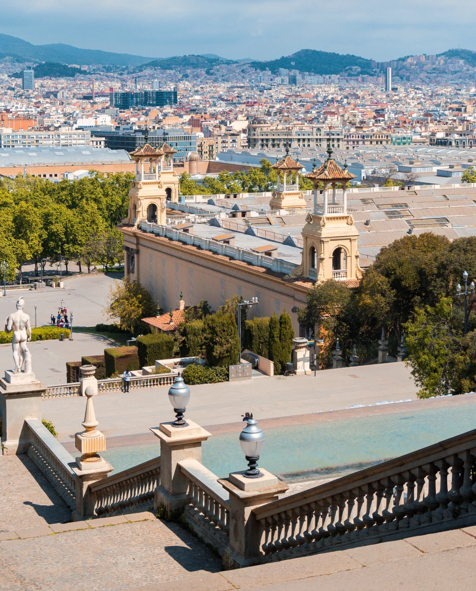 stairs with city and mountains in the distance