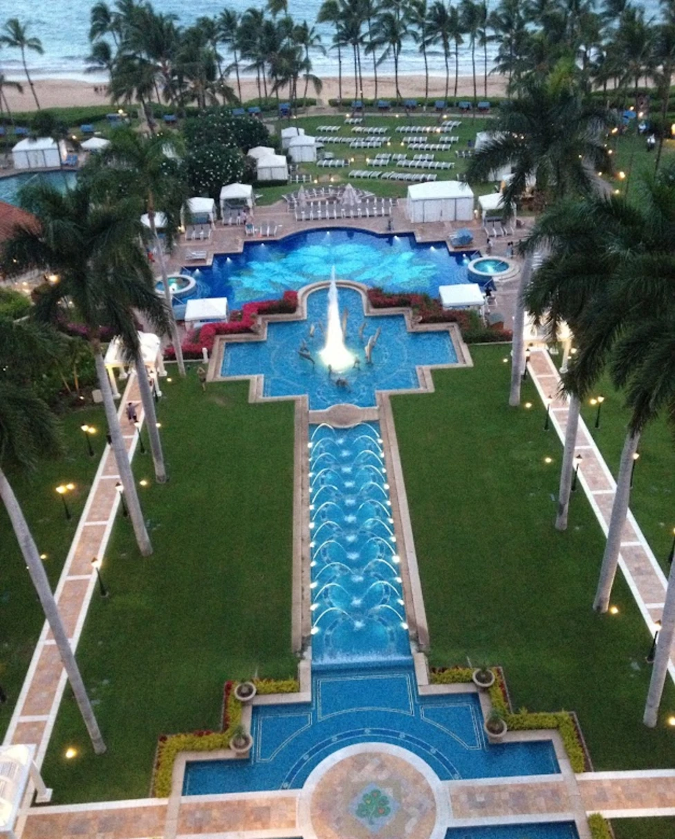 Beautiful view trees on the side of the swimming pool island
