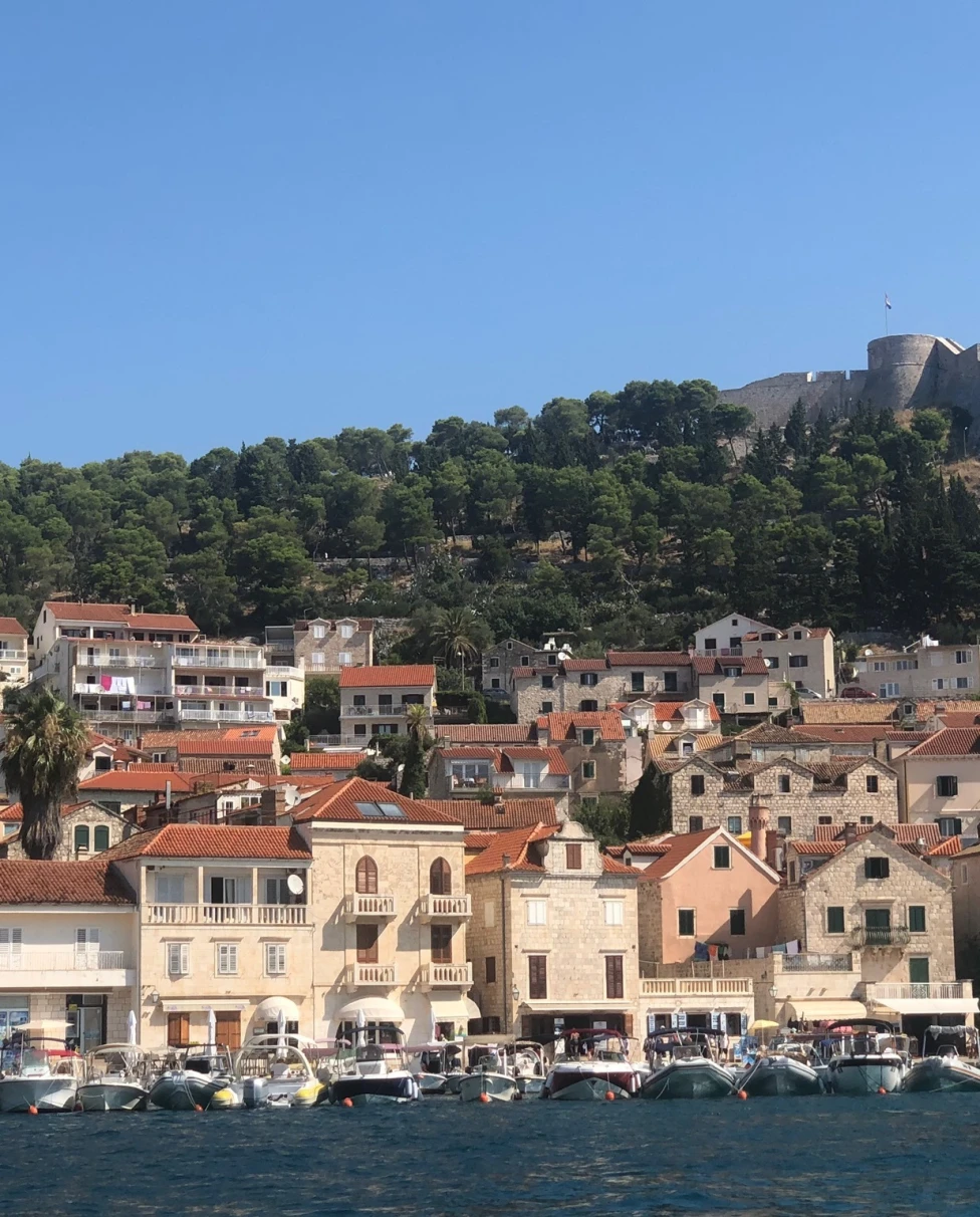 Water body with buildings on the shore.