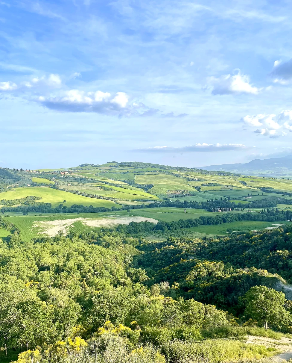 This image depicts Val d'Orcia in a wide and beautiful countryside in southern Tuscany.