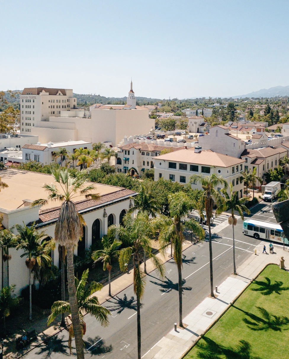 Colonial buildings and palm trees in Santa Barbara.