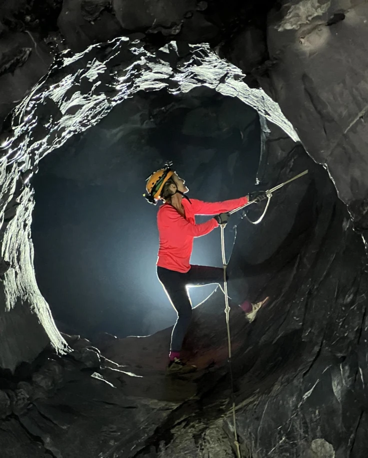 Cave diver descending into the James Bond Hole at Son Doong.
