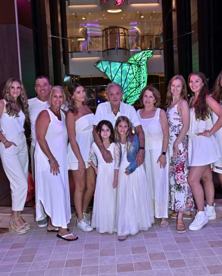 Family group photo onboard Utopia of the Sea.