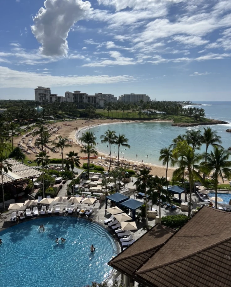 Aerial view of a beach and pool area during the daytime