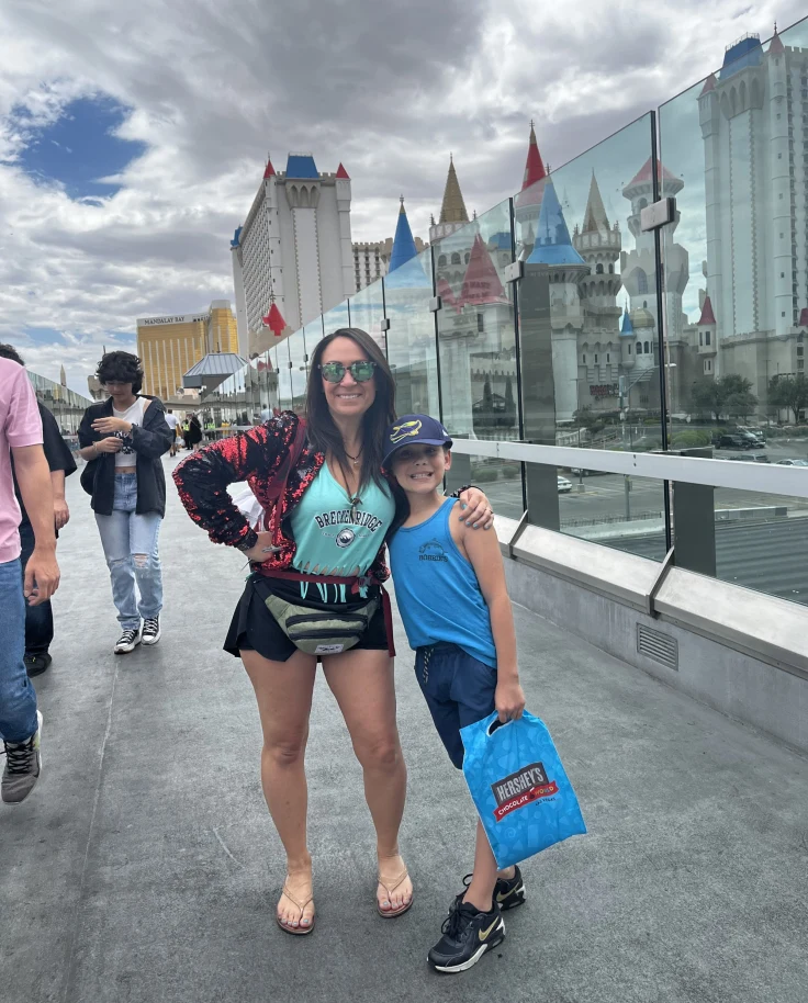 Travel advisor posing with a kid