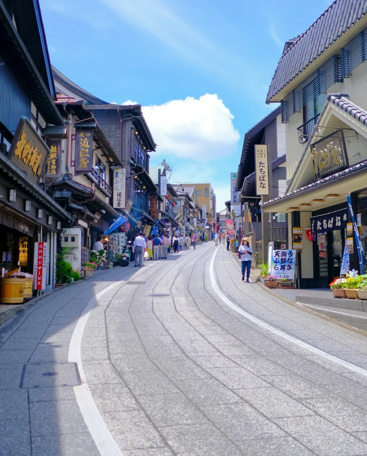 A shopping street with stalls on either side in Narita Japan.
