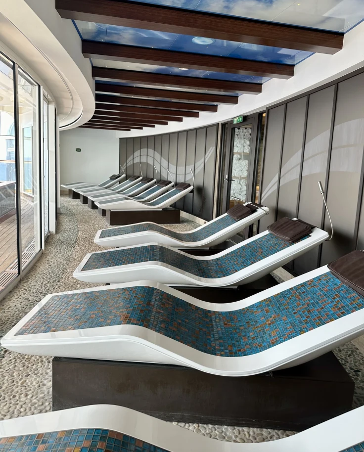 A room full of spa loungers