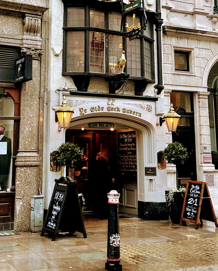Front of a white and black building, one of the best restaurants in London.