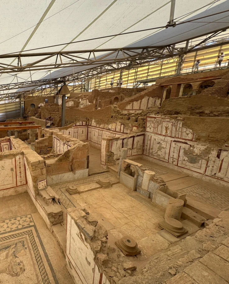Ancient ruins under a tent