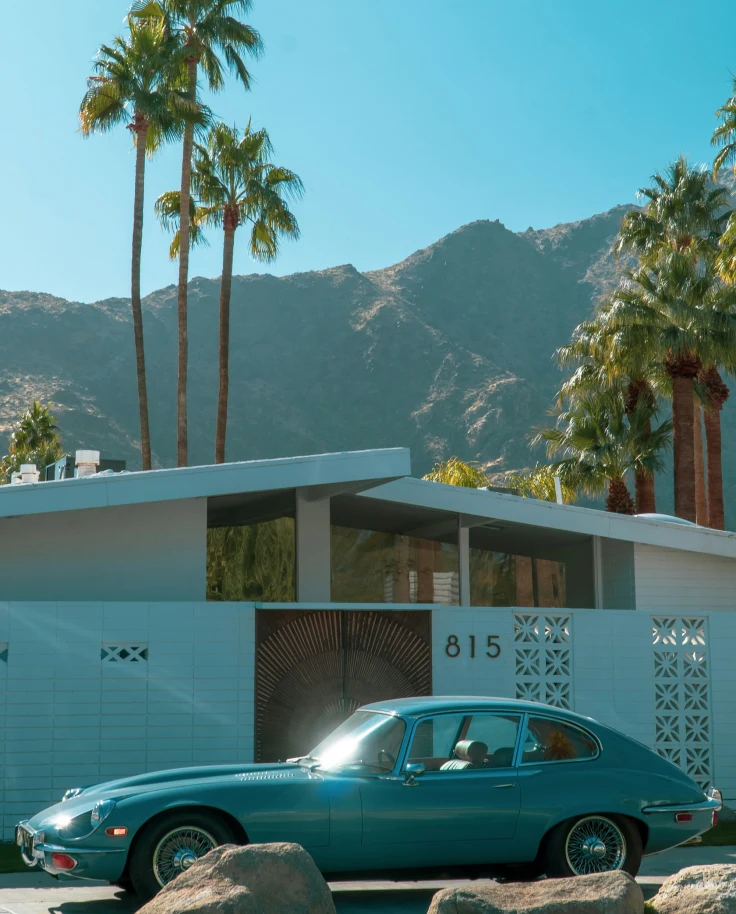 View of a house in front of a mountain