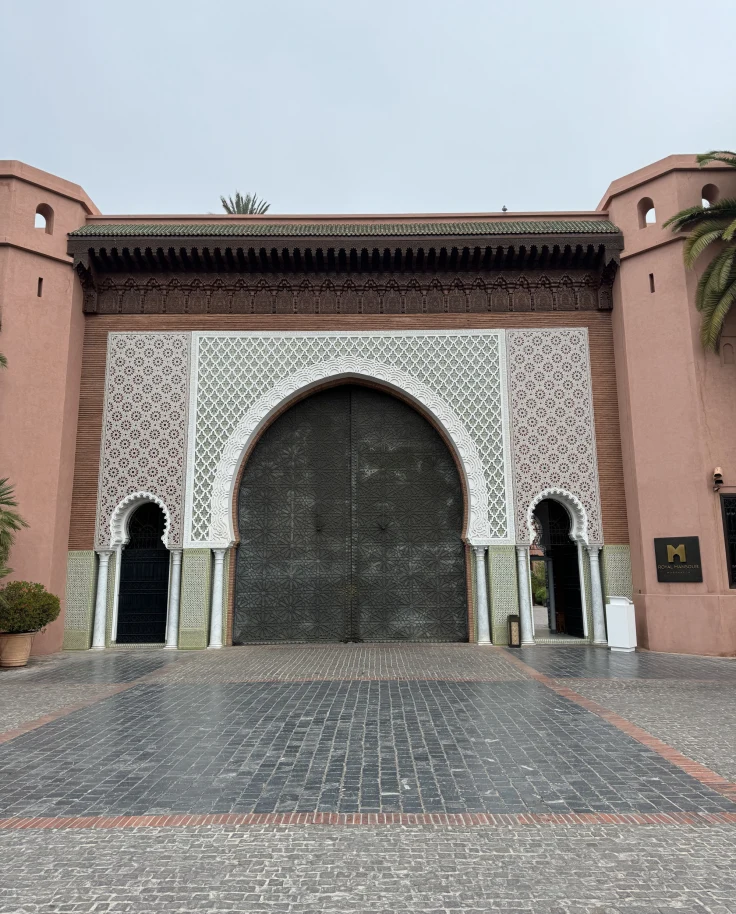 An arched wall entrance to a building