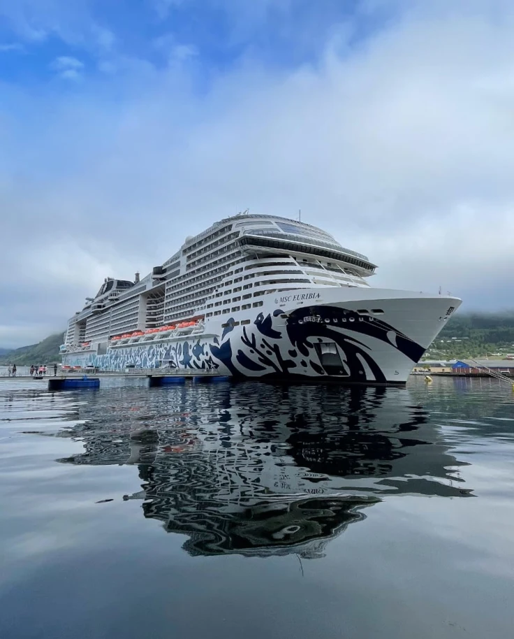 The MSC Euribia cruise ship in a river at Nordfjordeid - Leah Chen