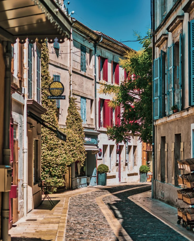 A street with buildings on both sides.