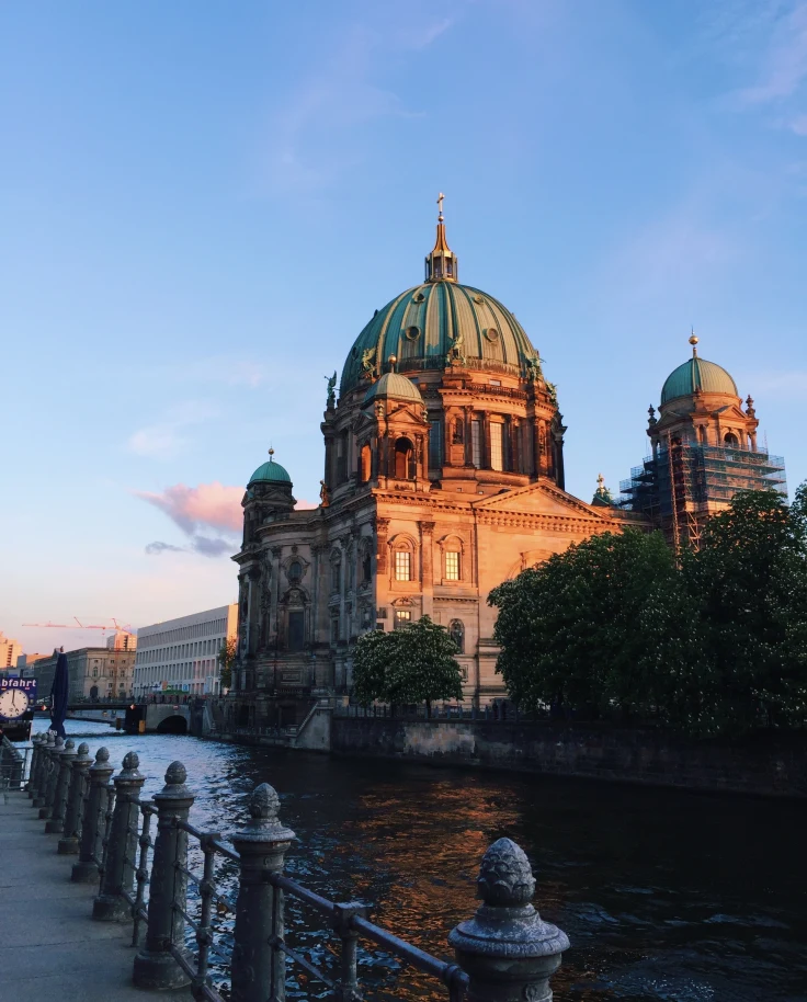 large building with dome during sunset