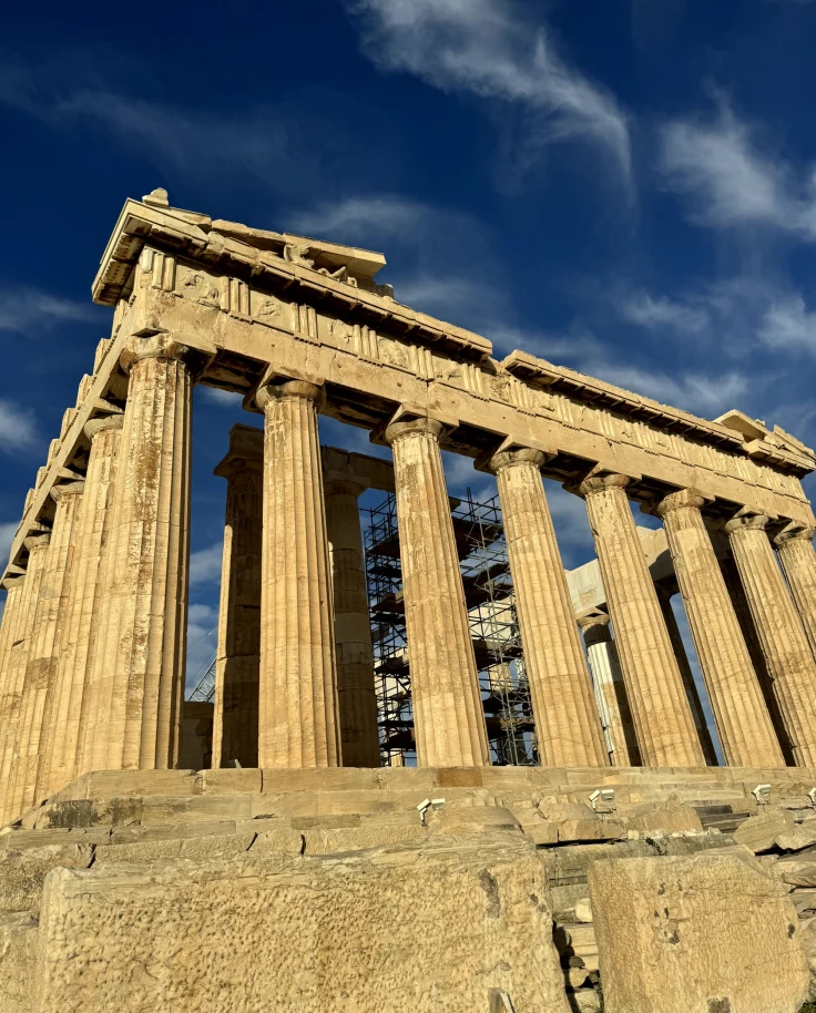 A low angle shot of the ancient pillars in the daytime.