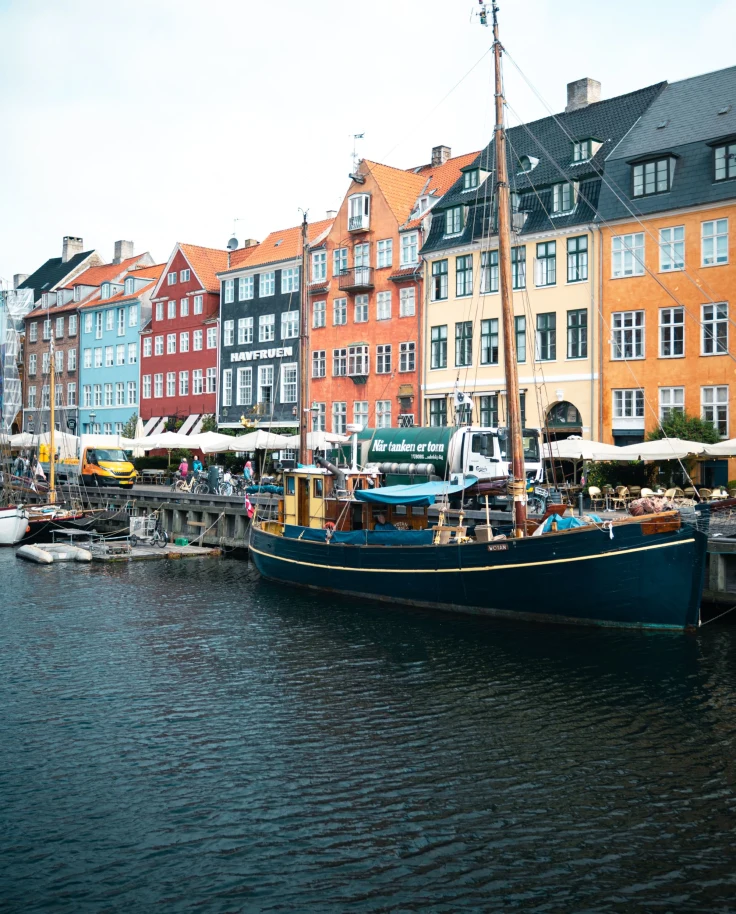 colorful buildings and boats on a canal