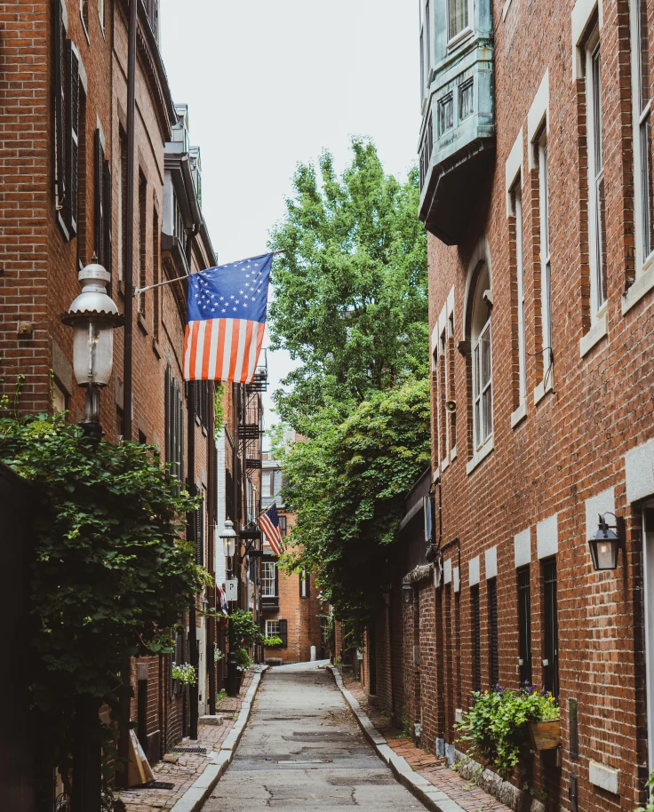 Street lined with brick buildings during daytime