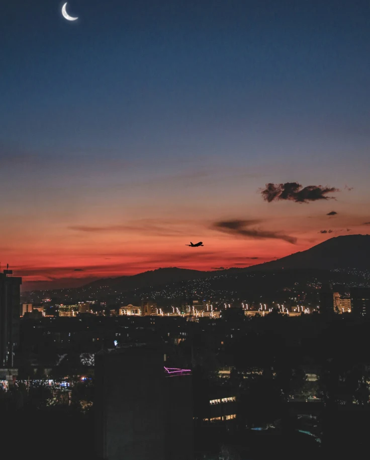 A sunset sky over a city