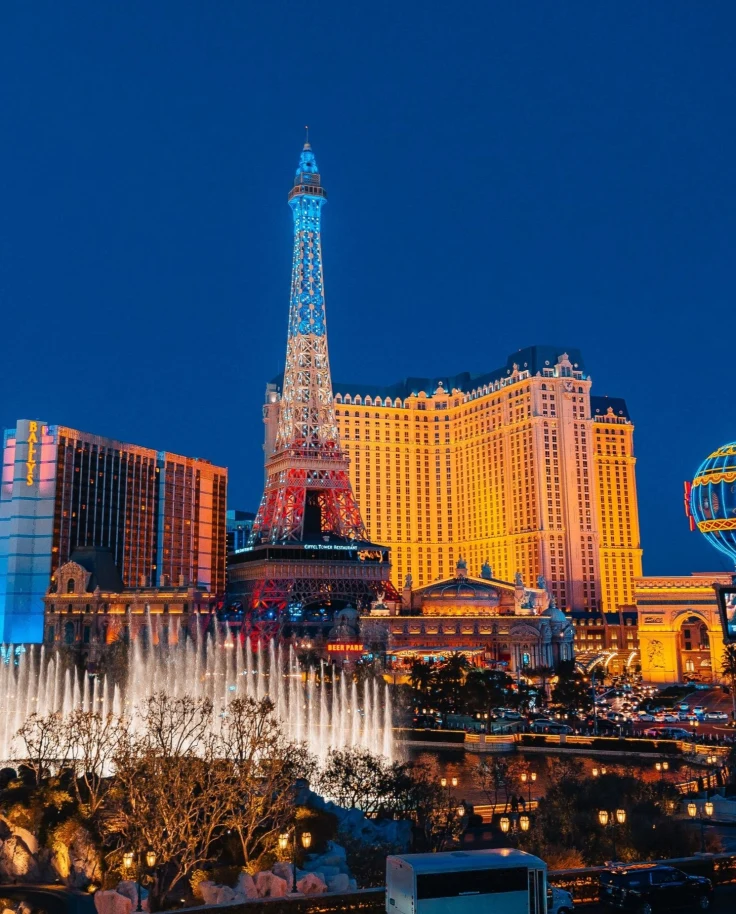 bright lights in a flashy city of hotels and tourist attractions at night
