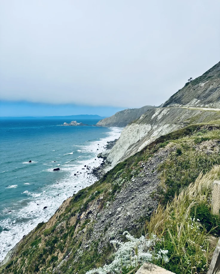 Blue water at the edge of California Coast.