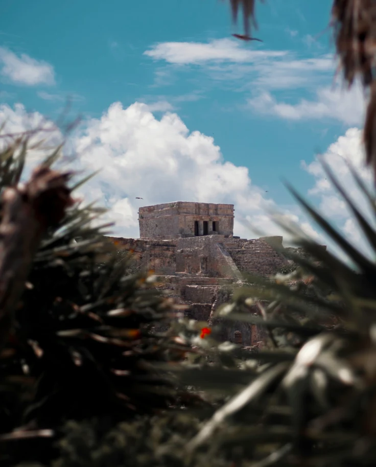 Old brick building on a hill.