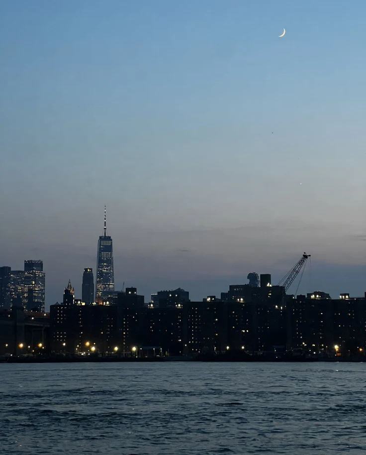 NYC skyline from across the East River after sunset
