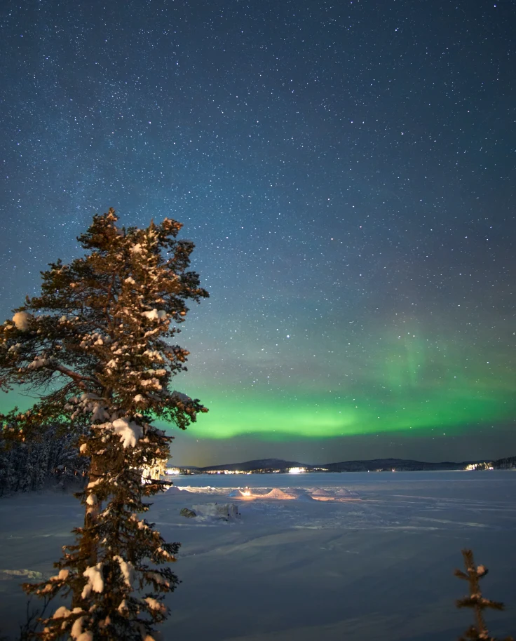 green lights in the night sky