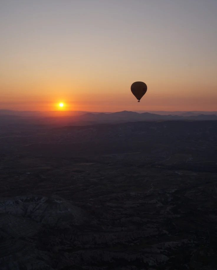 Hot air balloon in the sky during a sunset